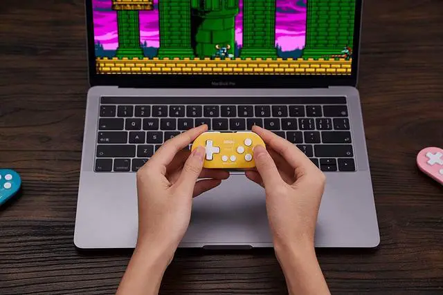 Alt view image 7 of 7 - Zero 2 Bluetooth Gamepad Keychain Sized Mini Controller with Mobile Clip for Switch, Windows, Android (Yellow Edition)
