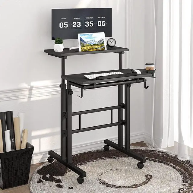 Alt view image 4 of 7 - Klvied Mobile Standing Desk with Cup Holder, Portable Stand Up Desk, Adjustable Height Small Standing Desk, Rolling Desk with Wheels, Home Office Laptop Cart, Computer Desk for Standing or Sitting