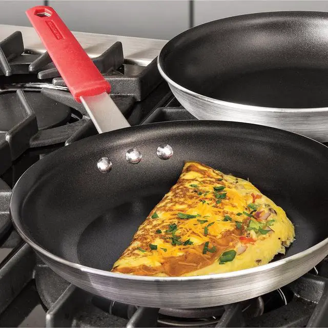 Alt view image 2 of 5 - Tramontina Professional 10-Inch Non Stick Frying Pan, Heavy-Gauge Aluminum Skillet with Reinforced Nonstick Coating, Red Handle, Dishwasher and Oven Safe