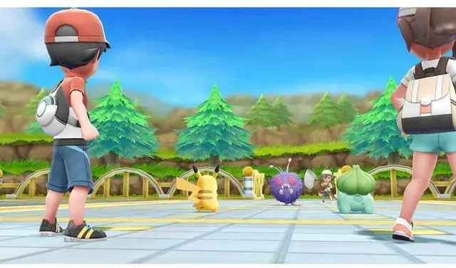Alt view image 4 of 7 - Nintendo Switch White OLED Console with Pokemon Let's Go, Pikachu!, Surge Accessory Gaming Kit, MightySkins Console and Controller Skin Voucher, and 2 Year CPS Extended Warranty