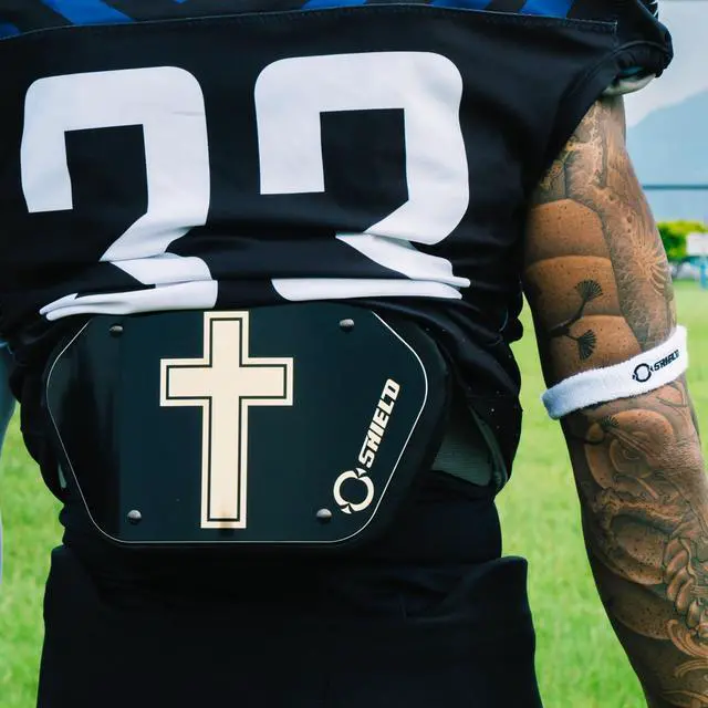 Alt view image 6 of 6 - O Shield Golden CROSS Chrome Football Back Plate, Lower Back Pads for Football Players, Rear Protector, Youth Fit