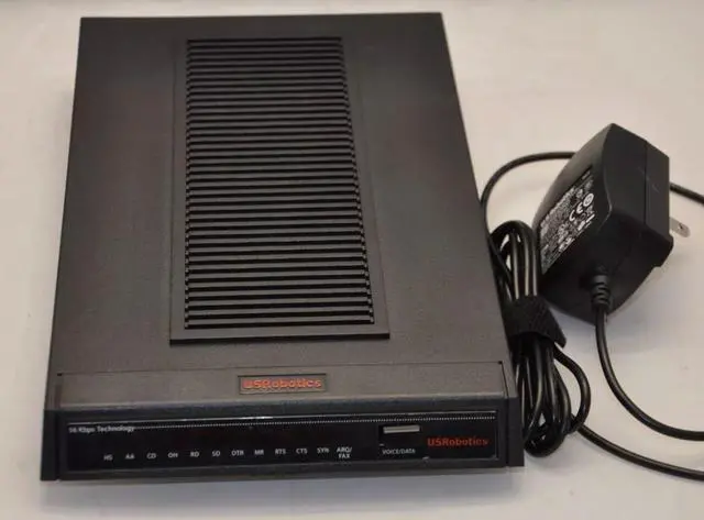 Main image of US Robotics Courier 3453C V.92 Business Modem 56K Serial with Adapter