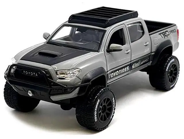 Alt view image 5 of 7 - 2023 Toyota Tacoma TRD PRO Off Road Truck Cement Gray with Black Hood and Roofrack 1/27 Diecast Model Car by Maisto