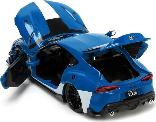 Alt view image 15 of 16 - 2020 Toyota Supra Blue with Graphics and Max Sterling Diecast Figurine "Robotech" "Hollywood Rides" Series 1/24 Diecast Model Car by Jada