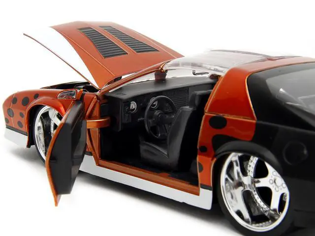 Alt view image 9 of 11 - 1985 Chevrolet Camaro Z/28 Orange Metallic w/Graphics & Chester Cheetah Diecast Figure "Cheetos" 1/24 Diecast Model Car by Jada