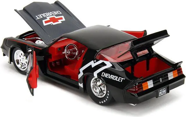 Alt view image 9 of 11 - 1979 Chevrolet Camaro Z28 "Chevrolet Performance" Black with Carbon Hood and Red Interior 1/24 Die Cast Model Car by Jada