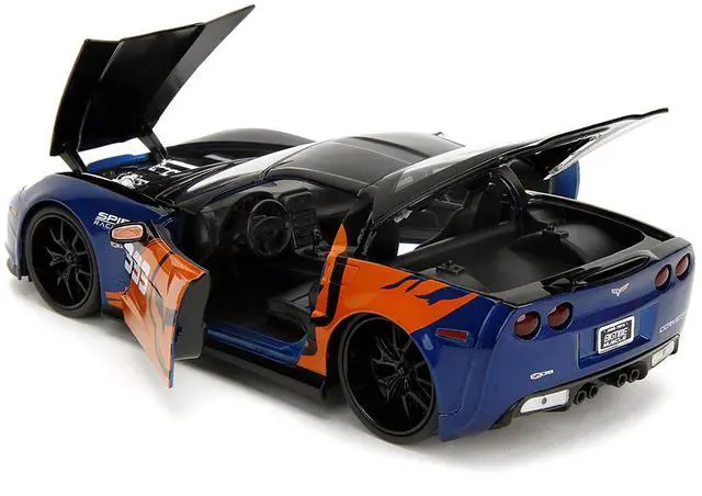 Alt view image 9 of 11 - 2006 Chevrolet Corvette Z06 #333 "Spirit Racing" Blue Metallic and Orange with Black Hood and Top 1/24 Diecast Model Car by Jada
