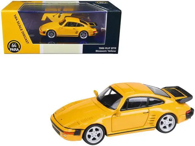 Alt view image 4 of 8 - 1986 RUF BTR Blossom Yellow 1/64 Diecast Model Car by Paragon Models