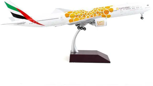 Alt view image 4 of 5 - Boeing 777-300ER Commercial Aircraft White with Orange Graphics "Gemini 200" Series 1/200 Diecast Model Airplane by GeminiJets
