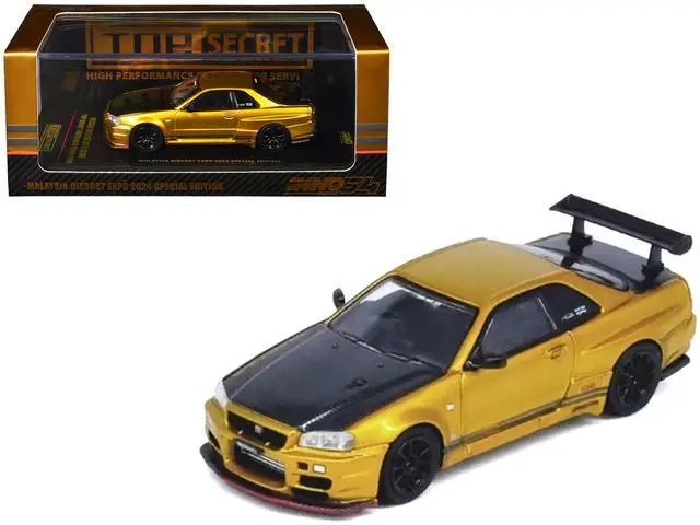 Alt view image 7 of 11 - Nissan Skyline GT-R (R34) RHD Gold Metallic with Carbon Hood and Trunk 1/64 Die Cast Model Car by Inno Models