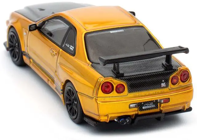 Alt view image 9 of 11 - Nissan Skyline GT-R (R34) RHD Gold Metallic with Carbon Hood and Trunk 1/64 Die Cast Model Car by Inno Models