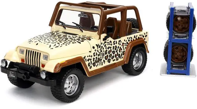 Alt view image 8 of 11 - 1992 Jeep Wrangler Tan and Brown with Graphics and Extra Wheels "Just Trucks" Series 1/24 Diecast Model Car by Jada