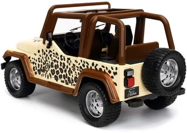 Alt view image 10 of 11 - 1992 Jeep Wrangler Tan and Brown with Graphics and Extra Wheels "Just Trucks" Series 1/24 Diecast Model Car by Jada