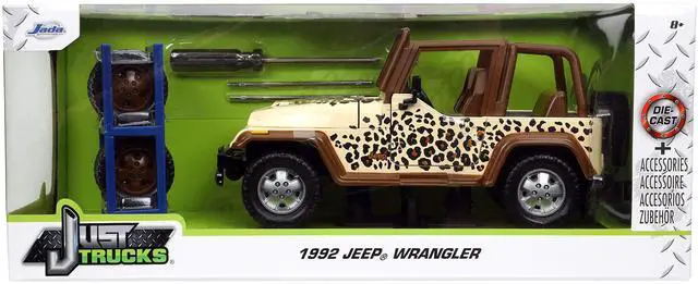 Alt view image 11 of 11 - 1992 Jeep Wrangler Tan and Brown with Graphics and Extra Wheels "Just Trucks" Series 1/24 Diecast Model Car by Jada