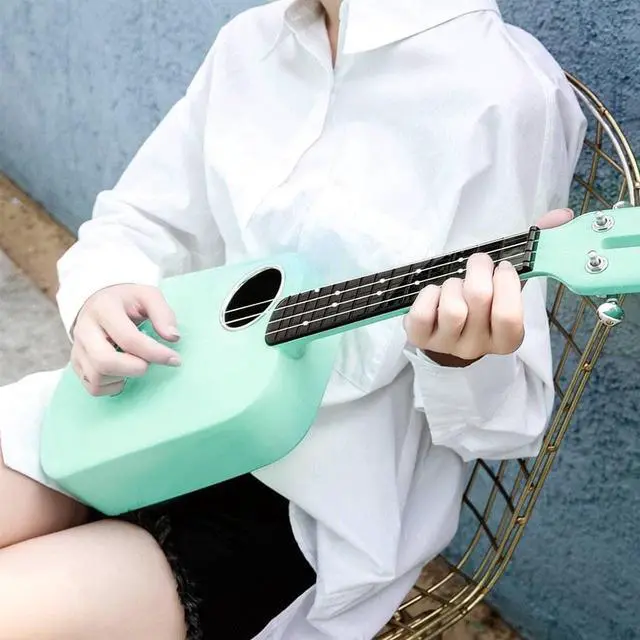 Alt view image 3 of 5 - Populele 2 23 Inch Carbon Fiber USB Smart Ukulele APP Control With Led Lamp Beads Cyan
