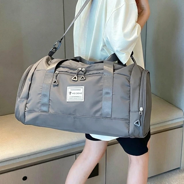 Main image of Black Large Capacity Travel Gym Bag with Clear Storage Pouch, Water Resistant Wear Resistant Duffel Bag, 2-Way Hand & Crossbody Carry Sports Bag