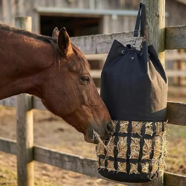 Alt view image 2 of 6 - Cylindrical Slow Feed Hay Net Bag, Large Capacity Horse Hay Feeder with Wide Drawstring Opening & Adjustable Hanging Straps, Feeding Bag for Horses, Goats & Donkeys