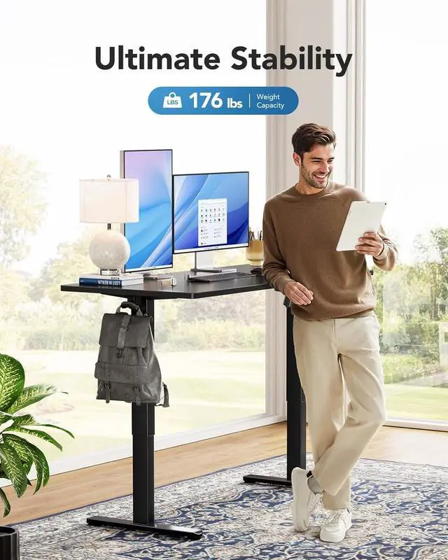 Alt view image 5 of 7 - HUANUO Electric Standing Desk, 48" x 24" Whole Piece Desktop, Adjustable Height Computer Desks, 4 Height Memory Settings, Sit Stand Up Desk for Home Office, Black