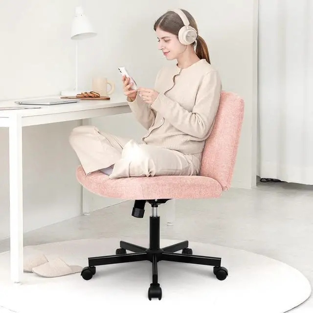 Alt view image 3 of 7 - Orange Factory Criss Cross Chair with Wheels, Armless Cross Legged Office Desk Chair, Wide Comfy Vanity Rolling Swivel Modern Comfortable Fabric Computer Task Chairs for Home Office (Pink)