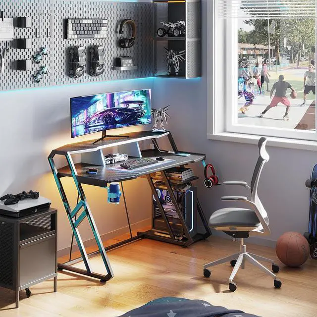 Alt view image 2 of 7 - MOTPK Gaming Desk with Power Outlet & LED Lights, Gaming Computer Desk 47inch with PC Storage Shelf, Gaming Table with Carbon Fiber Texture, Gamer Desk, Gift for Boys Men, Black