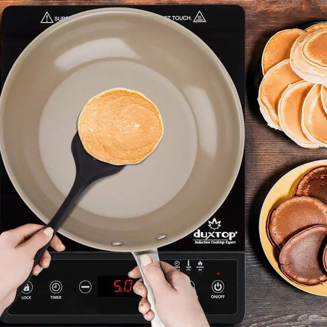 Alt view image 7 of 7 - Duxtop Ceramic Non-stick Frying Pan, Stainless Steel Induction Frying Pan, 9.5-Inch Stir Fry Pan with Heavy-gauge Impact-bonded Bottom, FUSION Ti