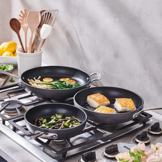 Alt view image 3 of 6 - All-Clad Black Nonstick 12-Inch Skillets Set of 3, 834, 1034, 1234