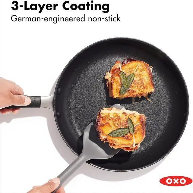 Alt view image 2 of 7 - OXO Good Grips 10 Piece Cookware Pots and Pans Set, 3-Layered German Engineered Nonstick Coating, Stainless Steel Handle with Nonslip Silicone, Gray