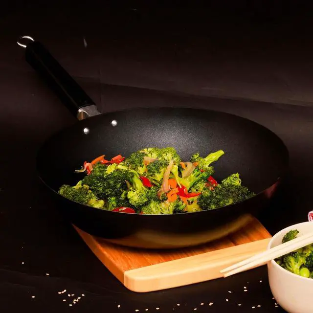 Alt view image 5 of 7 - JOYCE CHEN Professional Series 12-Inch Carbon Steel Excalibur Nonstick Stir Fry Pan with Phenolic Handle