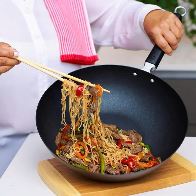 Alt view image 3 of 7 - JOYCE CHEN Professional Series 12-Inch Carbon Steel Excalibur Nonstick Stir Fry Pan with Phenolic Handle