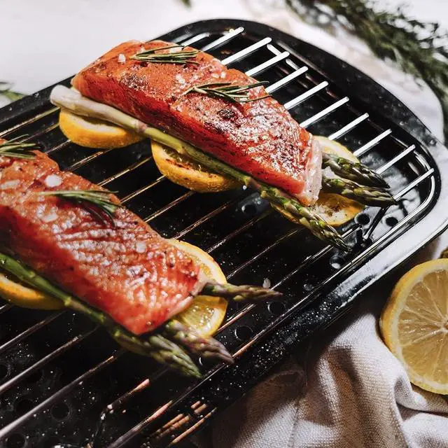 Alt view image 4 of 7 - Granite Ware 3 piece multiuse set. Enameled steel bake, broiler pan, and grill with rack. Versatile for oven and direct fire cooking. Resists up to 932°F.