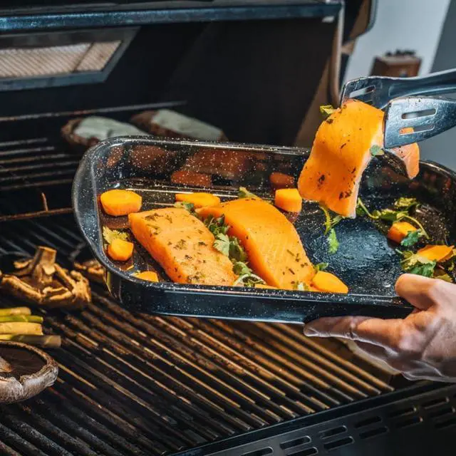 Alt view image 5 of 7 - Granite Ware 3 piece multiuse set. Enameled steel bake, broiler pan, and grill with rack. Versatile for oven and direct fire cooking. Resists up to 932°F.