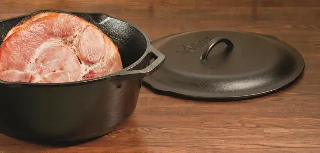 Alt view image 4 of 5 - Lodge 7-Quart Cast Iron Dutch Oven  Made in USA, Pre-Seasoned, PFAS-Free & Non-Toxic, Heat-Treated, Induction Compatible, Self-Basting Lid, Durable Multi-Use Cooking Pot for Oven to Table