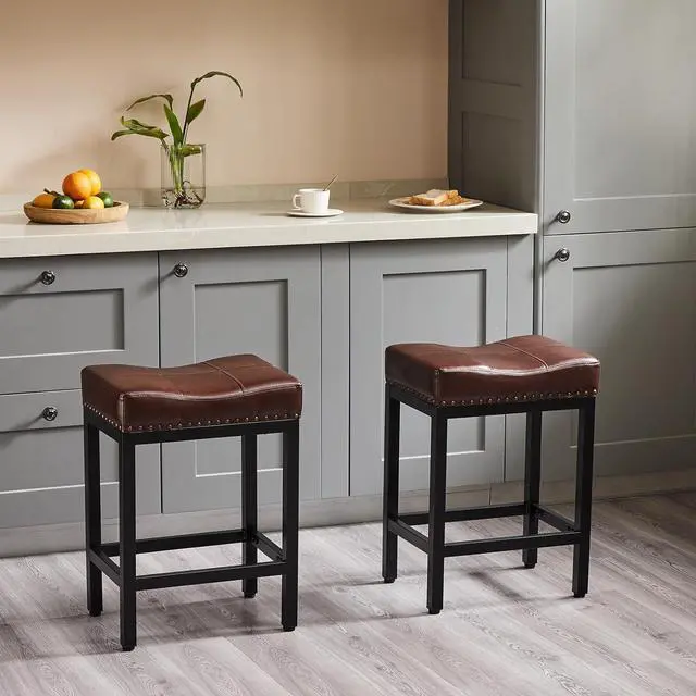 Alt view image 2 of 7 - DUMOS Saddle Bar Stools Set of 2, 24 Inch Counter Height Stools with Curved PU Leather Surface, 3.7" Thick Upholstery Bar Height Stools with Footrest for Kitchen Island, Dining, Cafe, Brown