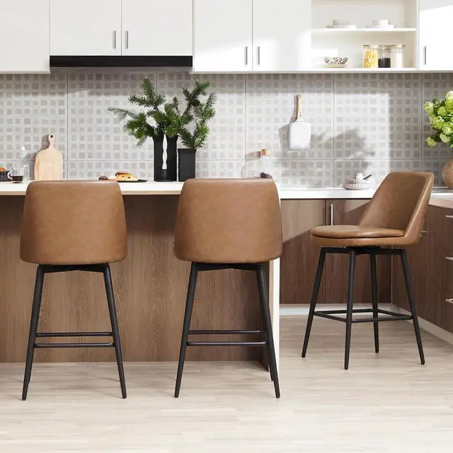 Alt view image 6 of 7 - CHITA Swivel Bar Stools, 27.2" Counter Height Bar Stools Set of 3, FSC Certified Upholstered Modern Counter Stools, Metal Legs, Faux Leather, Saddle Brown