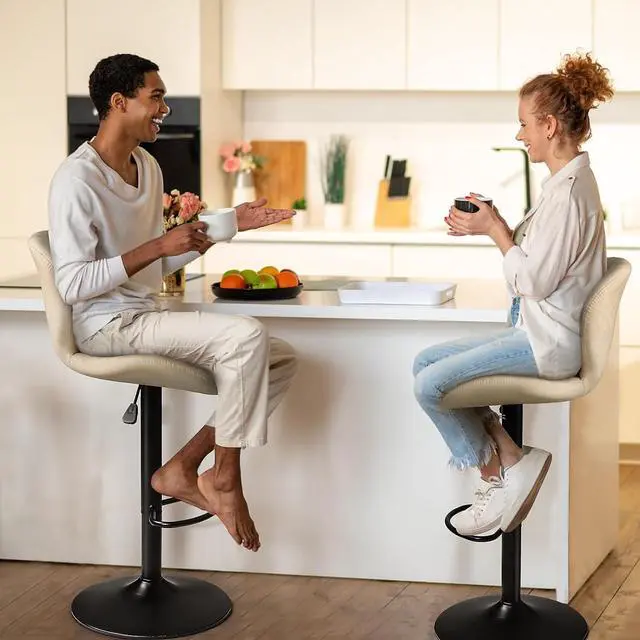 Alt view image 6 of 7 - PUKAMI Bar Stools Set of 2,Adjustable Swivel Counter Height Bar Stools with Back & Footrest,Modern Design Bar Chairs,Faux Leather Upholstered Barstools for Bar,Kitchen,Dining Room (Beige, Set of 2)