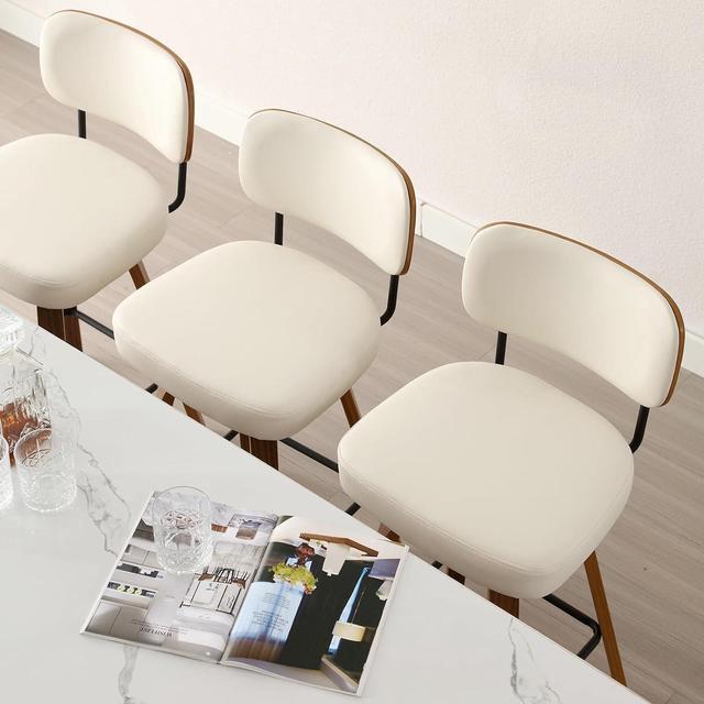 Alt view image 7 of 7 - Swivel Counter Height Bar Stools Set of 4, 26" Upholstered Faux Leather Barstools with Back and Bent Wood Legs, Mid Century Modern Bar Chair Island Stool for Kitchen Counter, Cream White