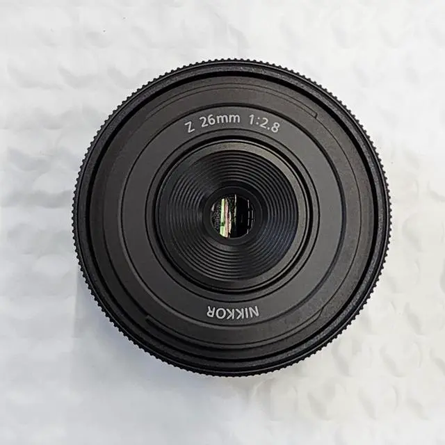 Main image of Nikon NIKKOR Z 26mm f/2.8 Lens (Nikon Z) - 20116