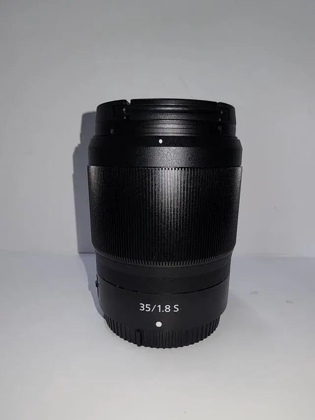 Alt view image 2 of 4 - Nikon NIKKOR Z 35mm f/1.8 S Lens 20081 - UV Filter + Hood Lens Bundle
