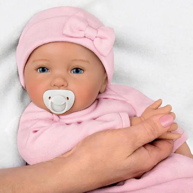 Alt view image 4 of 7 - The Ashton - Drake Galleries Mommy's Girl So Truly Real® Lifelike RealTouch® Vinyl Skin Hand-rooted Hair with Magnetic Pacifier & Realistic Weighted Doll by Ping Lau 17-inches