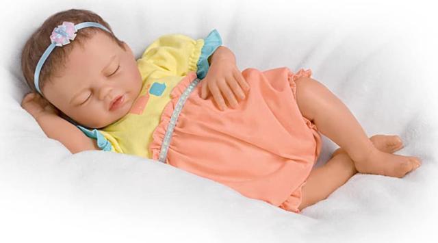 Weighted newborn baby best sale dolls