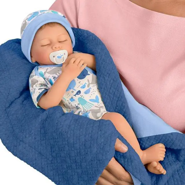 Alt view image 3 of 7 - The Ashton - Drake Galleries Seaside Dreams "Breathing" With Quilted Blanket So Truly Real® Lifelike & Handcrafted RealTouch® Vinyl Skin Weighted For Realism Baby Doll by Andrea Arcello 16-inches