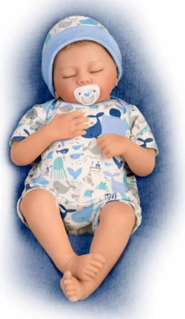 Alt view image 7 of 7 - The Ashton - Drake Galleries Seaside Dreams "Breathing" With Quilted Blanket So Truly Real® Lifelike & Handcrafted RealTouch® Vinyl Skin Weighted For Realism Baby Doll by Andrea Arcello 16-inches
