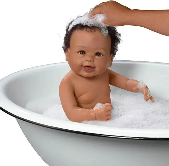 Alt view image 3 of 4 - The Ashton-Drake Galleries Linda Murray "Rub-A-Dub-Dub, Layla" Washable African American Black Baby Doll with Ducky Towel and Accessories, 17.5-Inch/44.5-cm