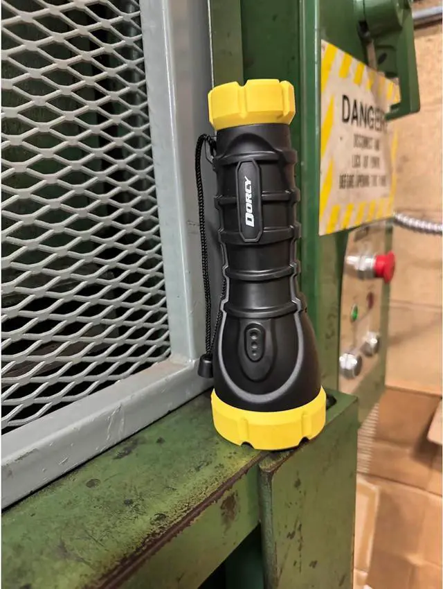 Alt view image 2 of 7 - Dorcy 180-Lumen Weatherproof Rubber LED Flashlight with Non-Slip Grip and Sealed Push Button, Assorted Colors (41-2968),Medium , Black