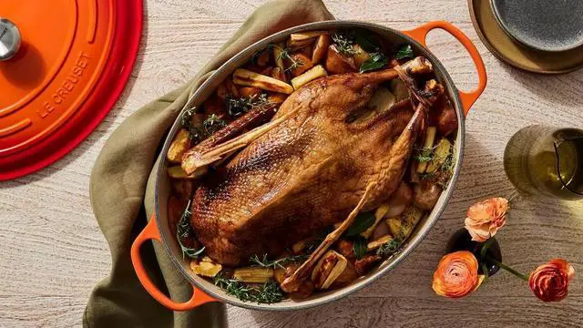 Alt view image 4 of 5 - Le Creuset Enamelled Cast Iron Signature Oval Dutch Oven, 15.5 qt, Flame