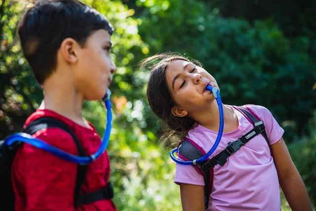 Alt view image 3 of 6 - CamelBak Kids Mini M.U.L.E. 50oz Lightweight Hydration Pack, Camo
