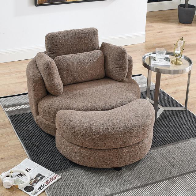 Large swivel best sale chair with footstool