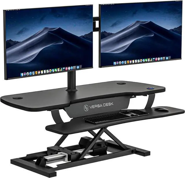 Main image of ® PowerPro 40" Electric Standing Desk Converter - Adjustable Height Desktop Riser with USB Charging Outlet & Detachable Keyboard Tray Holds 80 lbs Large Small Items | Black by DT