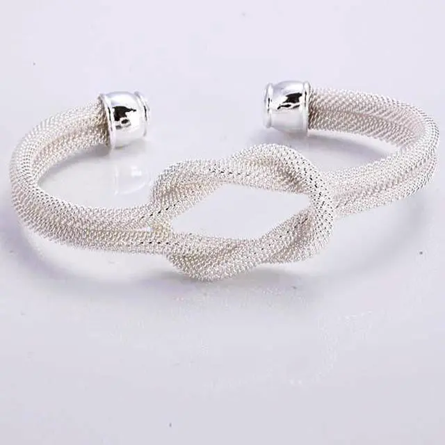 Main image of Vista Love Me Love Knot 925 SS Plated & 18 Kt Antique Gold Plated Cuff Bracelet - Gold