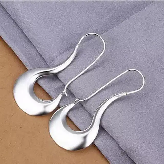 Main image of Vista Moon Dance Gold And Silver Crescent Earrings - Gold